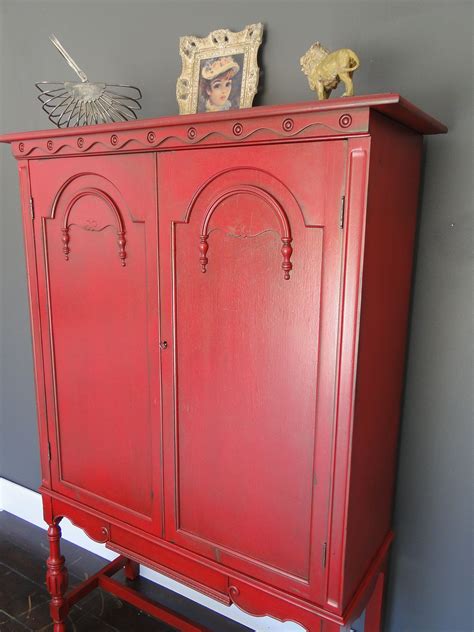 Simply Red This Antique Cabinet Is Tall And Slim In The Reddest Red