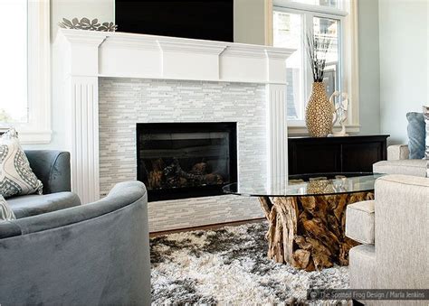 Jan 01, 2017 · a mantel refers to the shelf and/or pedestal legs that surround the fireplace. white glass marble tile fireplace. This looks very similar ...
