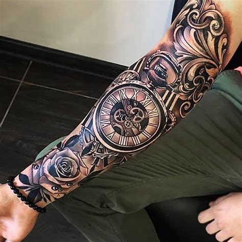 A Man With A Clock Tattoo On His Arm