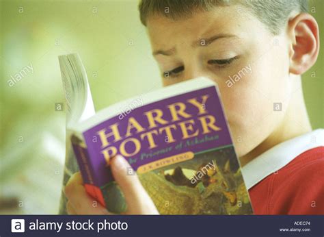 So much so that many of us are already planning on reading them to our own kids, because this one is probably on every books like harry potter list around, but it's for good reason. A young reader with a Harry Potter book Harry Potter and ...