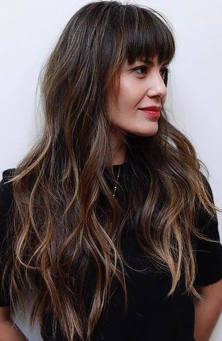 Bangs are perfect for framing your face and emphasizing your facial features like eyes and cheekbones. 25 Gorgeous Long Hair with Bangs Hairstyles - The Trend ...