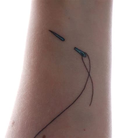 Needle And Thread Tattoo