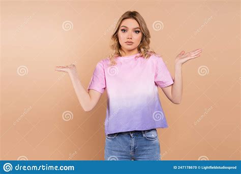 Confused Woman Showing Shrug Gesture And Stock Photo Image Of Babe Pretty