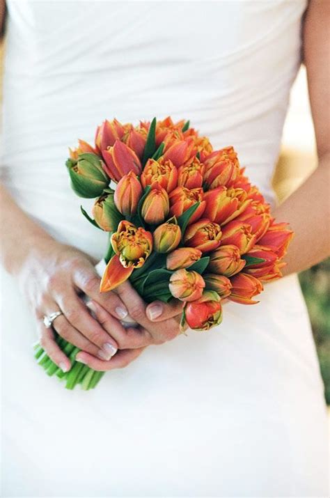 Flowerama las cruces offers a variety of flowers, plants, and gift options. Casual wedding bouquet of orange tulips.