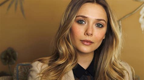 Elizabeth Olsen Humanizes Celebrity On Happy Sad Confused