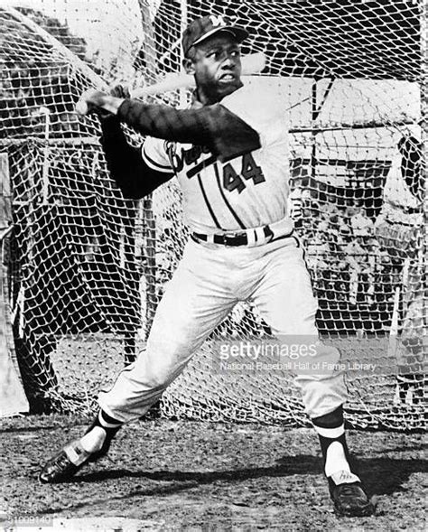 Hank Aaron Of The Milwaukee Braves Swings At A Pitch Aaron Played In