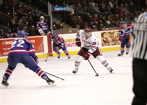 Hockey is a sport in which two teams play against each other by trying to manoeuvre a ball or a puck into the opponent's goal using a hockey stick. UMass hockey releases 2014-15 schedule: Opener against ...