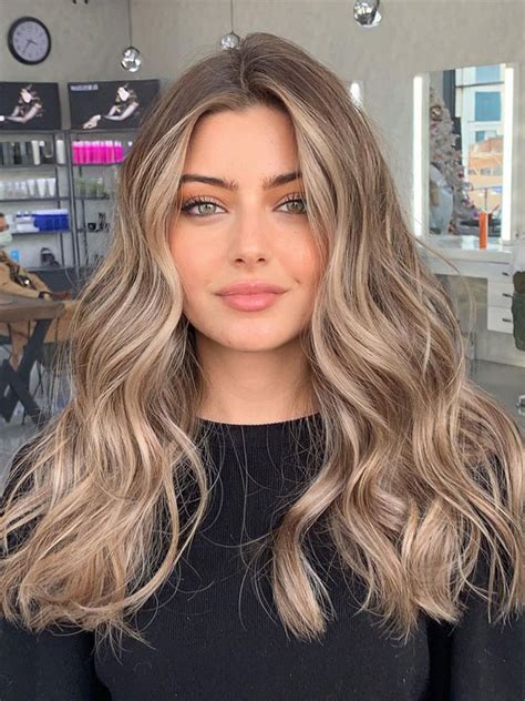 Best Hair Colours To Look Younger Glam Blonde With Waves