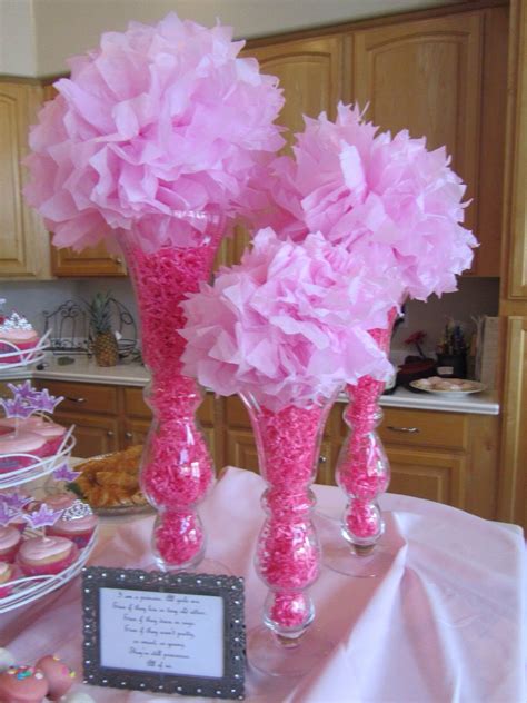 This style can also be used for any pink and gold themed parties! Pink baby shower centerpiece. Tall vases pink filler paper ...