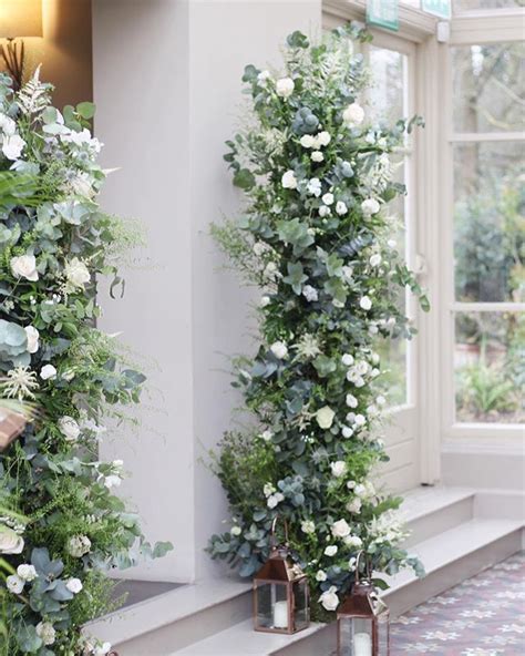 Make an entrance with these floral columns. | Ceremony flowers, Flower