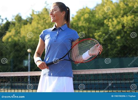 Woman Tennis Player Showing Yes Gesture After Winning Point Successful