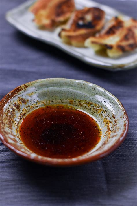 For gyoza dipping sauce, mix together rice vinegar, soy sauce, garlic, ginger, green onion, sesame oil and chili flakes. My Favourite Dipping Sauce Recipe for Gyoza (餃子のタレ) - Sudachi