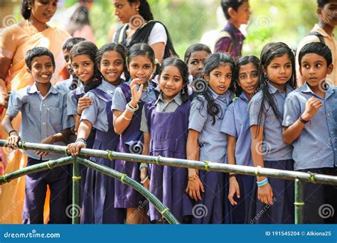 Different Indian School Children In Traditional Uniforms Pose Smiling