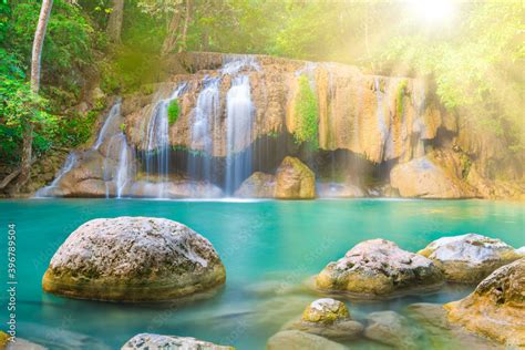 Tropical Landscape With Beautiful Waterfall Emerald Lake And Rocks In