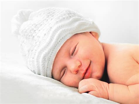 Why Do Babies Smile and Laugh in Their Sleep?