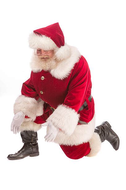 130 Santa Kneeling Stock Photos Pictures And Royalty Free Images Istock