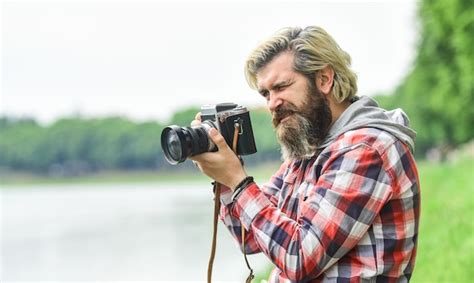 Premium Photo Masterpiece Shot Man Bearded Hipster Photographer Hold