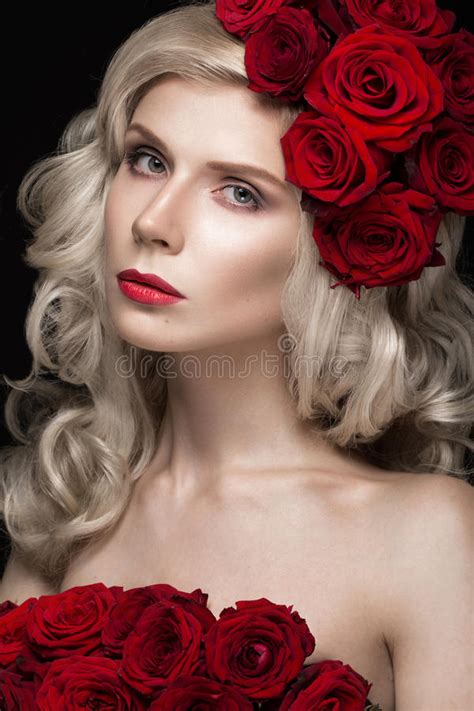 Beautiful Blond Girl Lying On Background Of Roses Curls Red Lipstick