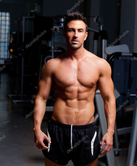 Fitness Shaped Muscle Man Posing On Gym Stock Photo By ©lunamarina 8511411