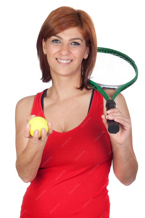 Красивая рыжая девушка с теннисной ракеткой изолированных на белом фоне Премиум Фото