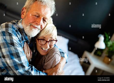 Elderly Couple In Love Senior Husband And Wife Hugging And Bonding With True Emotions Stock