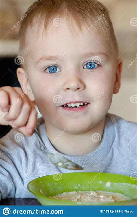 Cute Caucasian Baby Boy With Blue Eyes And Blond Hairs