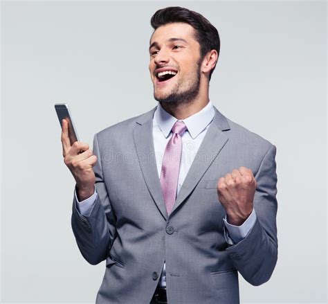 Cheerful Businessman Holding Smartphone Stock Photo Image Of Happy