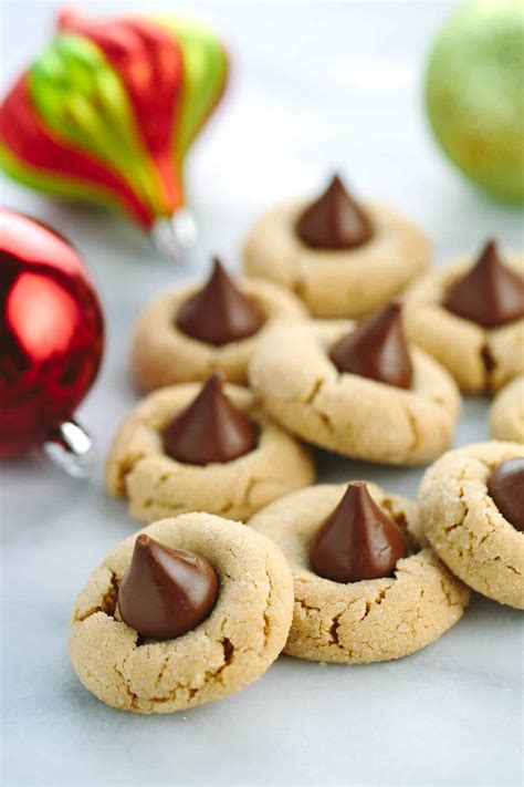 I remember my grandmother making these cookies every christmas, but i think i remember her placing a hershey kiss on the top of the cookies during the last few minutes of baking. hershey kisses cookie recipes