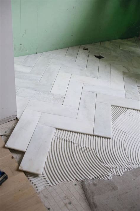 Try This Herringbone Marble Tile Unique Bathroom Tiles Herringbone