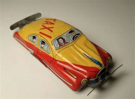 Vintage Tin Litho Penny Toy Yellow Taxi Cab Car Antique Price Guide