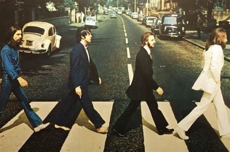 The Beatles 14 Iconic Photos Of The Band Including Abbey Road