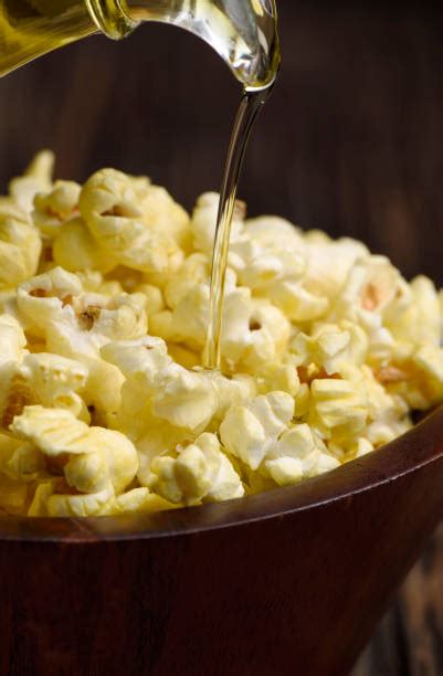 Best Buttered Popcorn Stock Photos Pictures And Royalty Free Images Istock