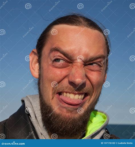 Young Man Made Ugly Face Stock Photo Image Of Emotion 137176102
