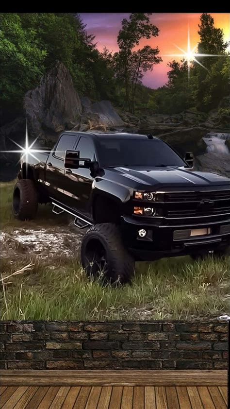 Download Sleek Black Chevrolet Silverado Pickup Truck Wallpaper