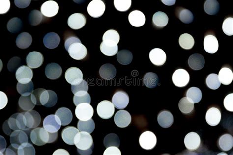 Bokeh White Lights On Black Background Abstract Defocused Many Round