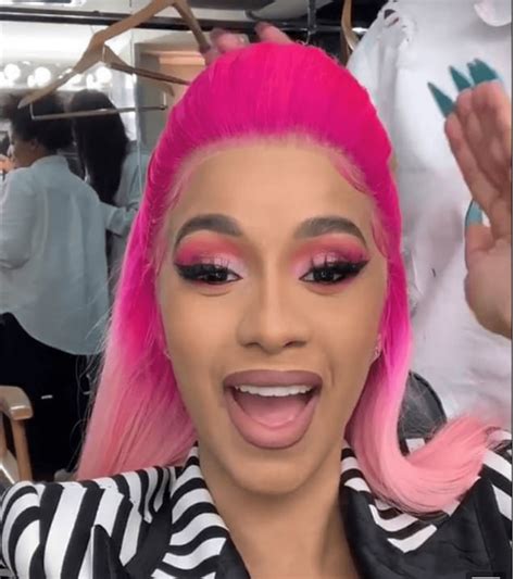 Cardi B Shows Off Pink Hair While Rocking Striped Dolce And Gabbana Suit