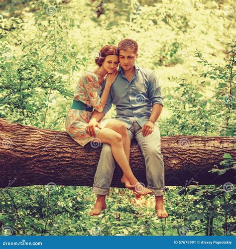 Smiling Loving Couple Sitting On Tree Stock Image Image Of Outdoor Male 57679991
