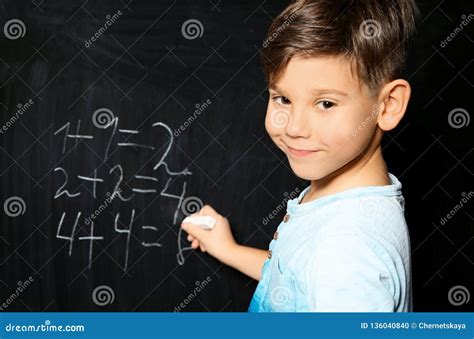 Little Child With Chalk Doing Math Stock Photo Image Of Cute