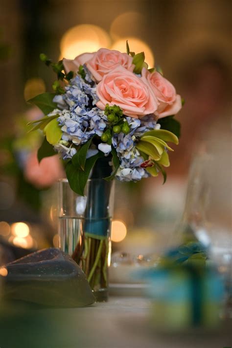Blue Hydrangeas With Green Hypericum Berries Green Orchids And Peach