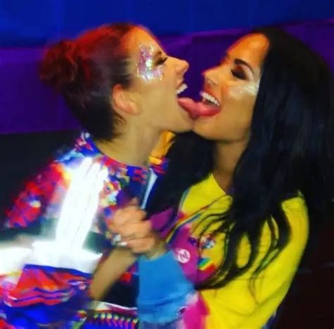 Demi Lovato Sets The Internet On Fire By Touching Tongues With Backup