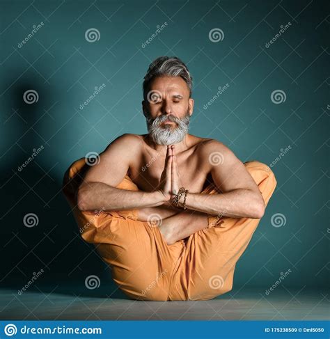 Old Man With Grey Beard Doing Yoga Pilates Fitness Training