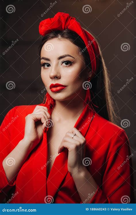 Beautiful Woman In Red Stylish Model With Red Lipstick On The Lips Bright Nail Polish Stock