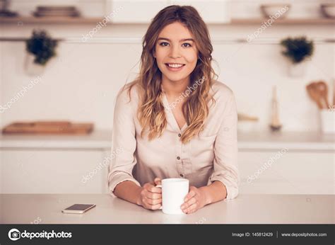 Beautiful Girl In Kitchen Stock Photo By ©vadimphoto1 145812429