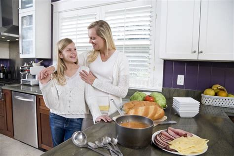 Mother And Daughter In Kitchen Making Lunch Stock Image Image Of Smiling Female 14563813