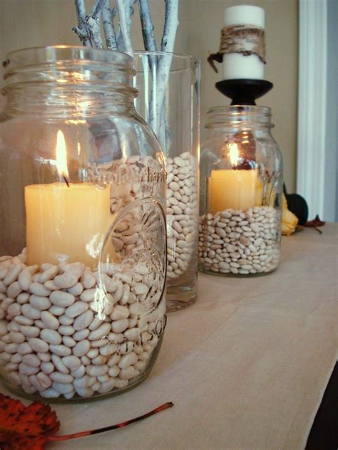 To try and save money we are filling half of the tables at the reception with flowers (pink tulips) and half with pillar candles. Vase filler for entry way table with candles and beads ...