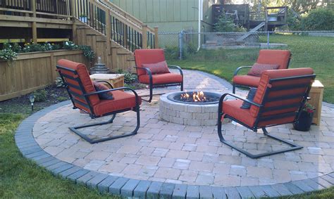 Featuring a stacked faux stone base and a natural granite tabletop, this unit makes for a great focal point to any patio area. DIY Propane gas Firepit, bricks from Menards, firepit bowl from Home Depot, Propane gas firepi ...
