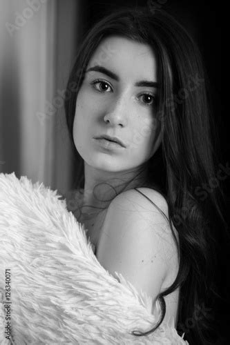 Naked Sensual Girl In Fur At Dark Room Monochrome Stock Photo And