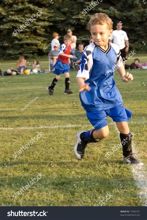 Young Boy In Uniform Playing Soccer Stock Photo 17595721 Shutterstock