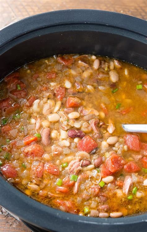 Add the ham, salt, pepper, and reserved seasoning packet to the soup. Crock Pot 15 Bean Soup Recipe - Ham and Beans Soup