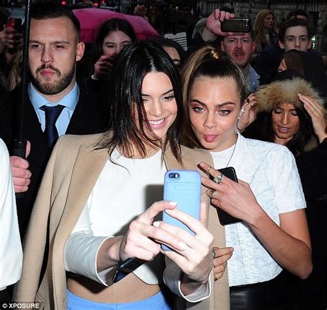 Kendall Jenner And Cara Delevingne Cosy Up At London Fashion Weeks